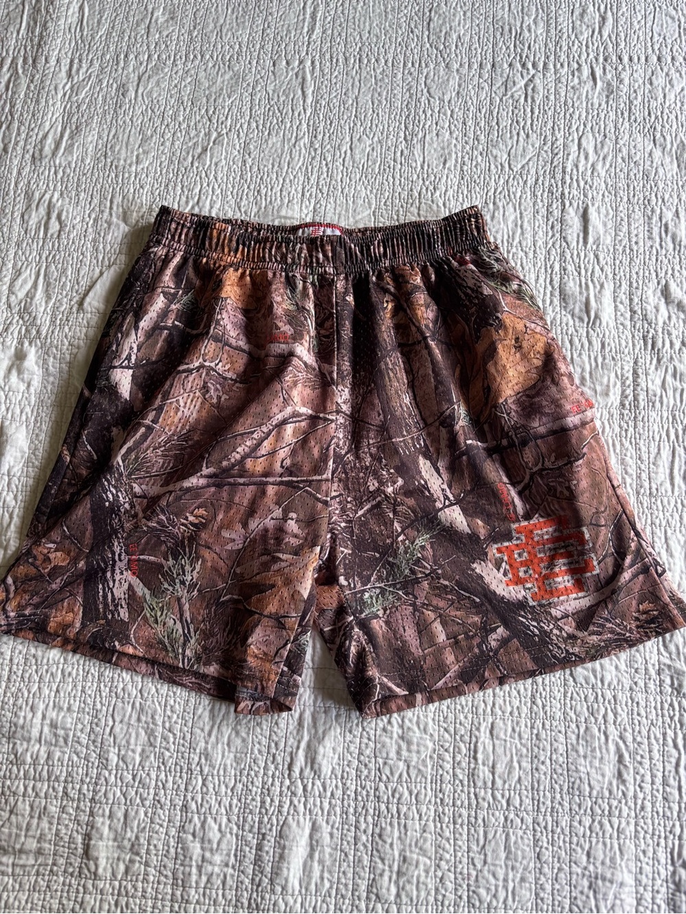 Eric Emanuel Camouflage Athletic Shorts with Orange Logo